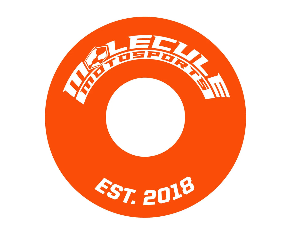 Laser engraving detail on orange anodized aluminum bar end.