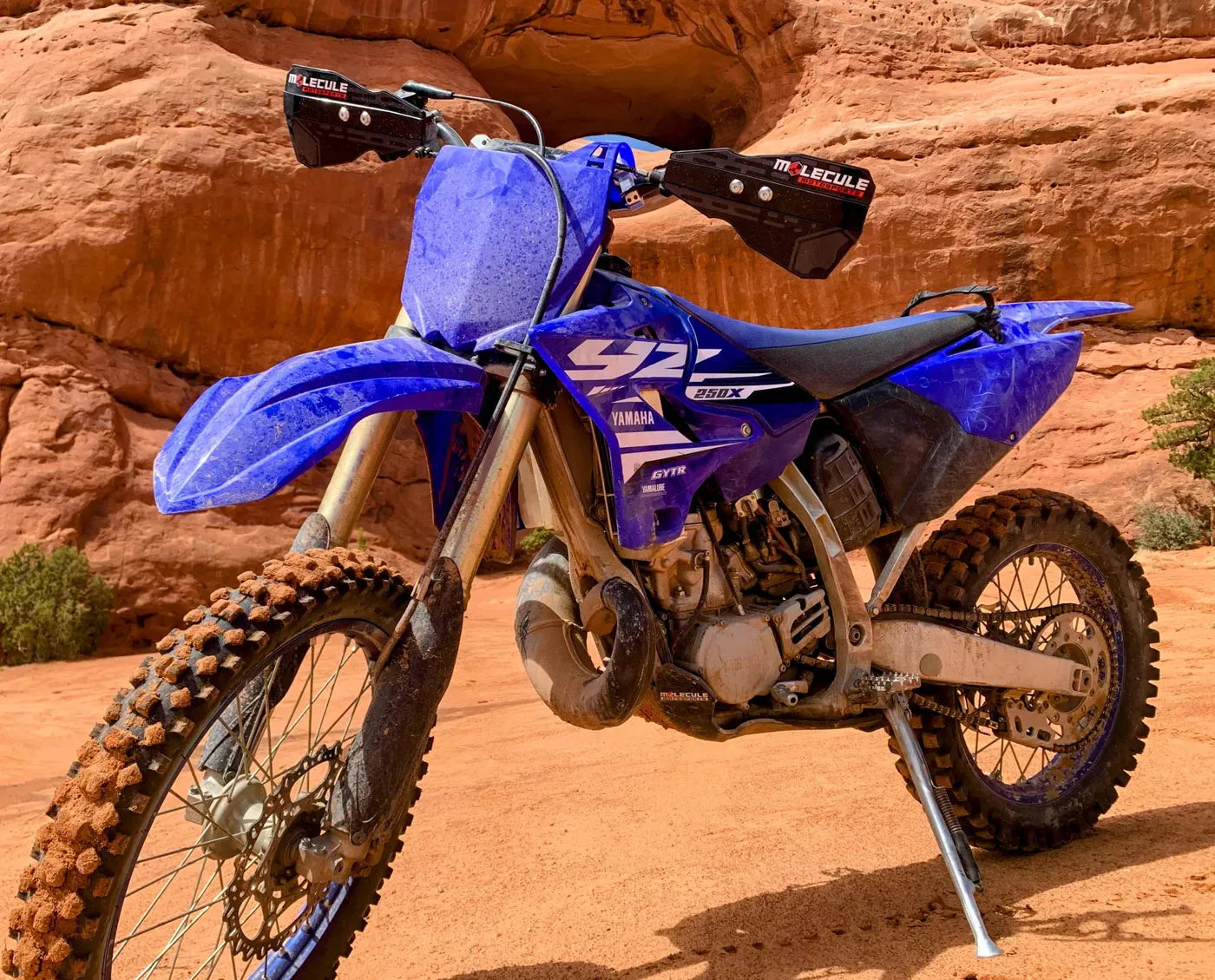 Blue Yamaha dirt bike on a rocky terrain