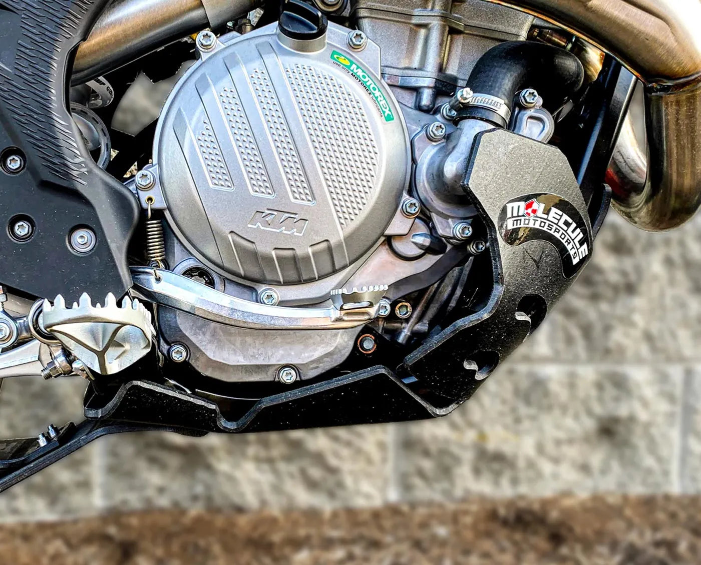 Side view of a Molecule Motorsports Skid Plate