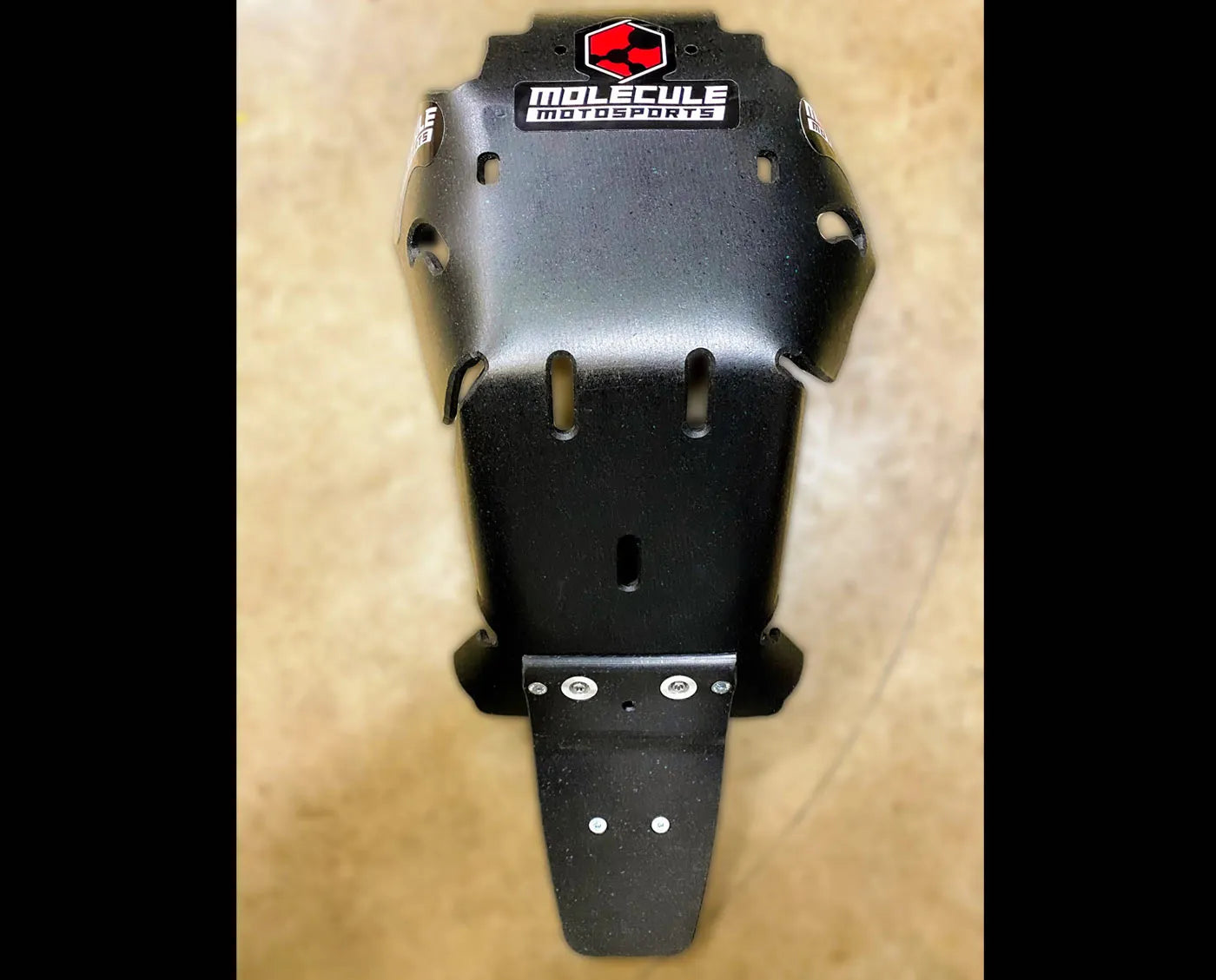 Bottom view of a KTM skid plate by Molecule Motorsports