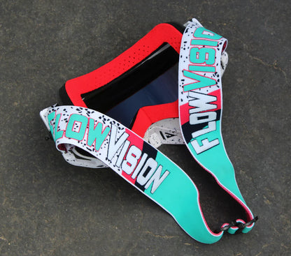 Colorful goggles with 'Flow Vision' branding on a dark background