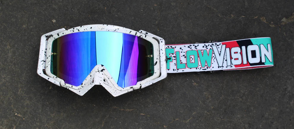 Flow Vision Splatter Goggles with blue reflective lenses and a colorful 'FlowVision' strap on a dark background