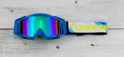 Blue goggles with colorful lens on a wooden surface, featuring 'FlowVision' branding.