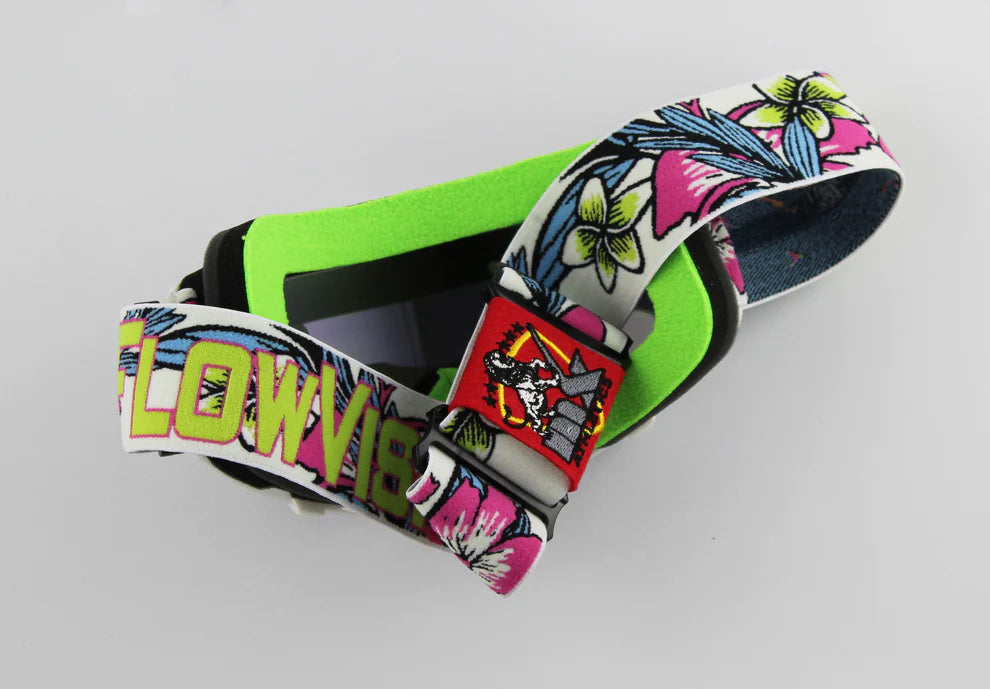 Colorful goggle strap with floral pattern and brand name on a gray background