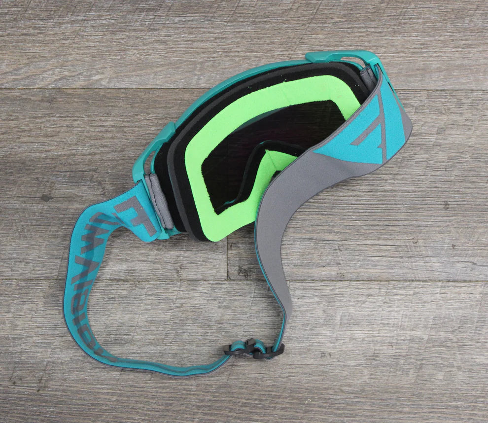 Teal green and grey goggles with a teal and grey strap by Flow Vision Goggles 