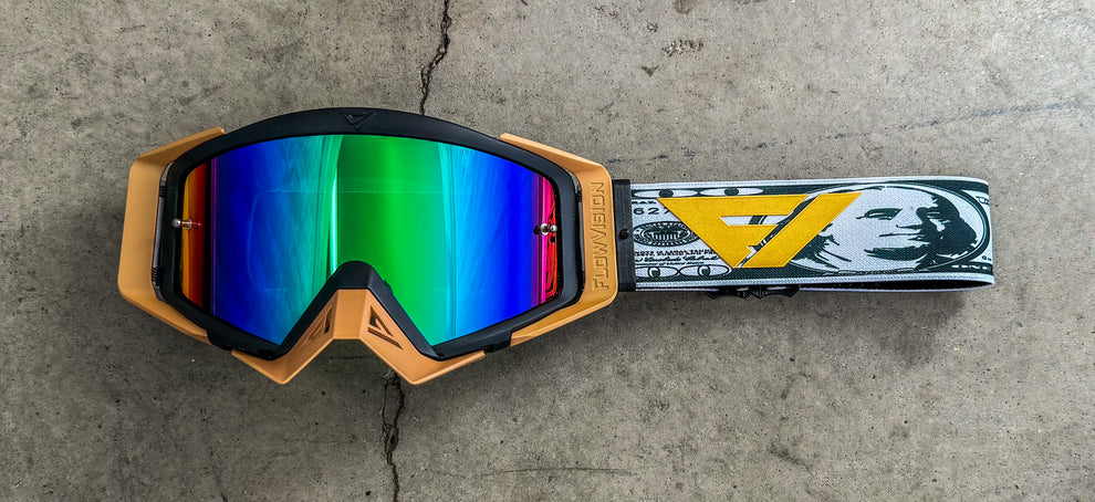 Flow Vision C-Note Goggles with a colorful lens and image of money on the strap 